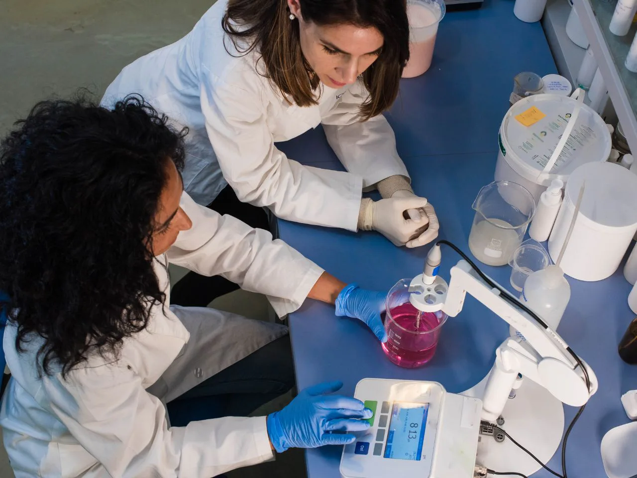 Chemical specialists collaborating in a laboratory